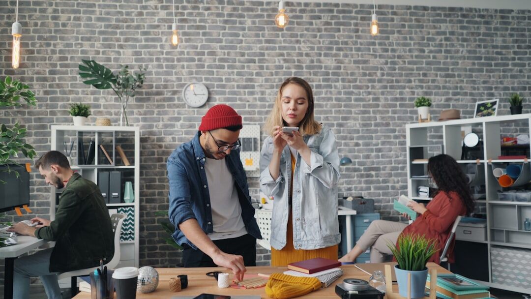 Young diverse team working together in a modern startup office