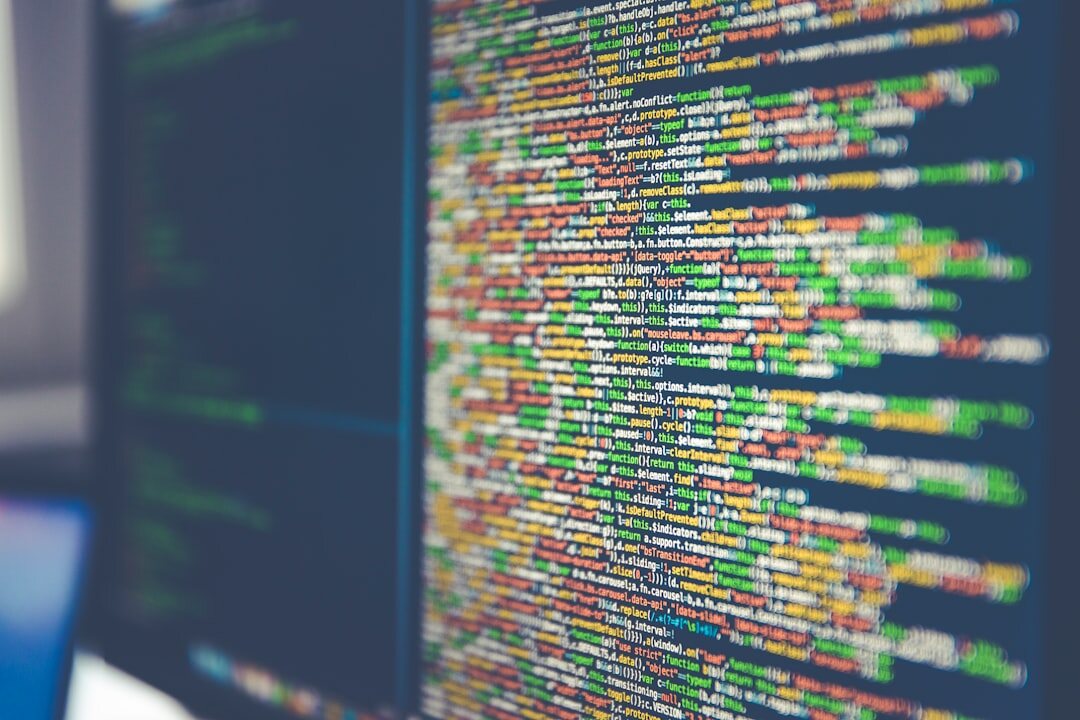 Computer screen displaying colorful programming code